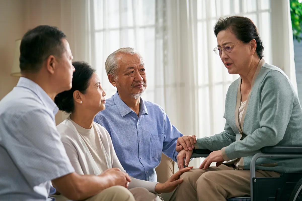 Elderly woman with friends